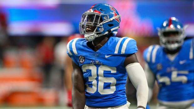 Sep 6, 2021; Atlanta, Georgia, USA; Mississippi Rebels linebacker Ashanti Cistrunk (36) celebrates after a tackle against the Louisville Cardinals in the second half at Mercedes-Benz Stadium. Mandatory Credit: Brett Davis-USA TODAY Sports